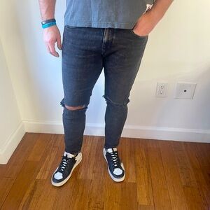 Diesel men’s jeans,black, slim with cut outs at the knees, size 31